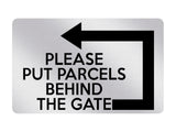 P012 PLEASE PUT PARCELS BEHIND THE GATE Left Plastic PVC Plaque Sign Card